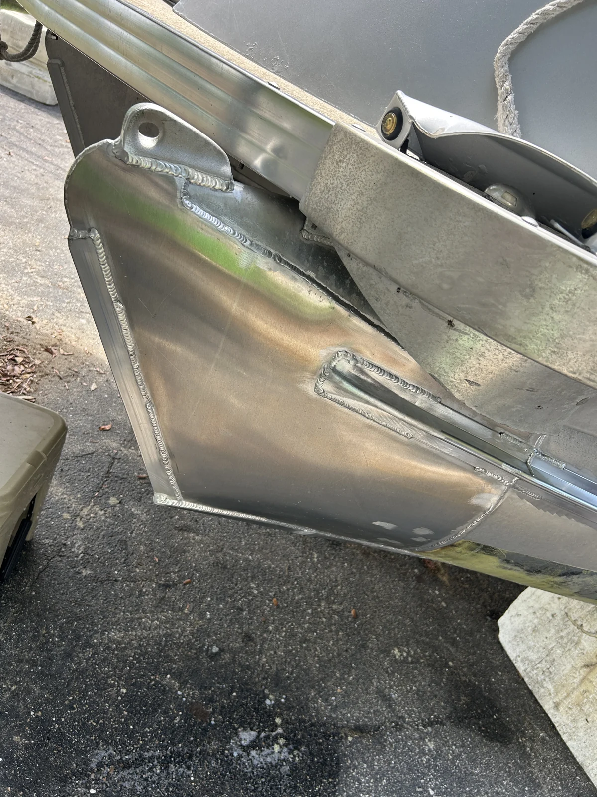 Aluminum marine repair patches and weld seams on a hull