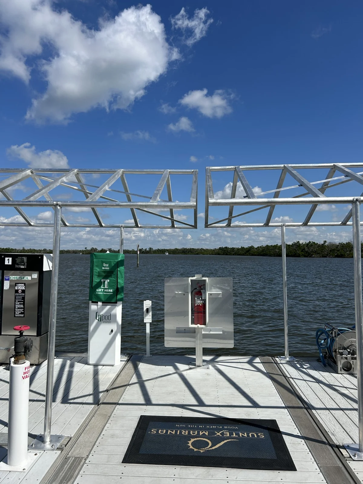 Fabricated metal framework over a Southwest Florida waterfront dock