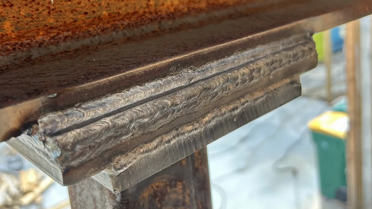 Close-up of a finished steel weld
